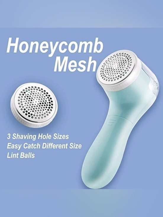 Other - Brand New Hand Held Lint Remover In Light Aqua Blue